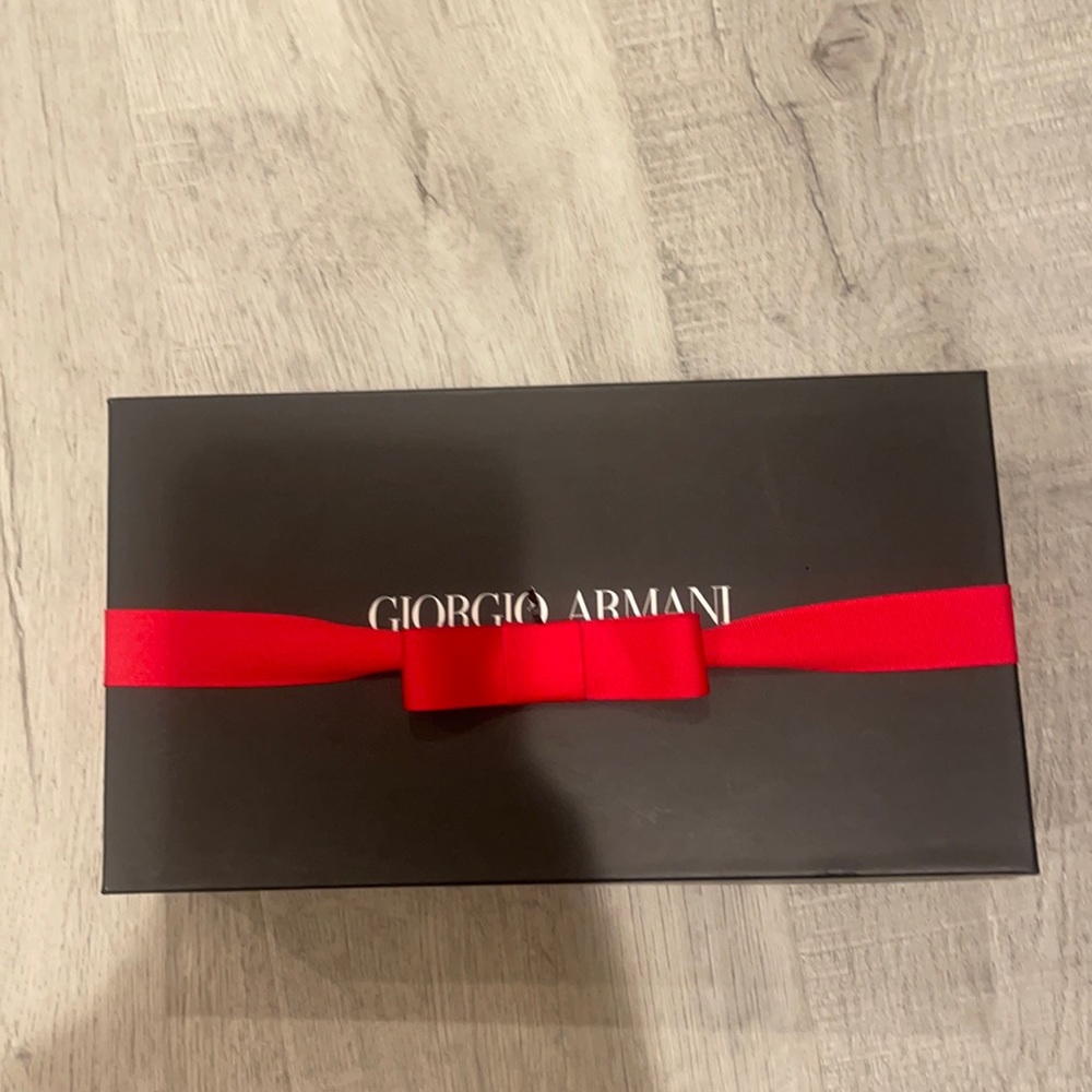 Georgia Armani sparkly black clutch